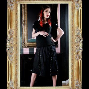 Black pleated skirt - super soft panel and adjustable waistband.